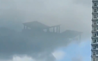 海口街头出现海市蜃楼：云中有建筑轮廓、形似天宫